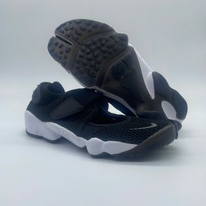 Nike Black and White Women’s Mesh Slip-On Sandals